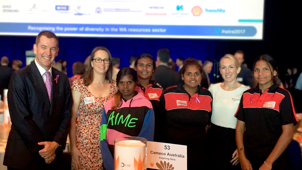 Four female students posing with Cameco